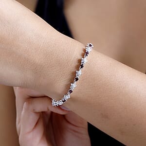 D'Joy Premium Anthill Garnet and Moissanite 6.00 ctw Flower Bracelet in Rhodium Over Sterling Silver (8.00 In)