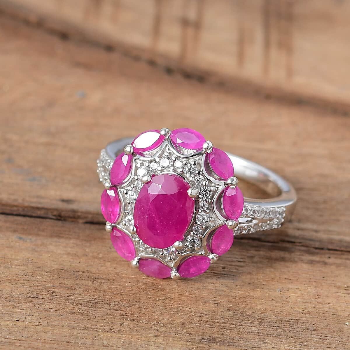 Doorbuster Royal Ruby and White Zircon 3.40 ctw Cocktail Ring in Rhodium Over Sterling Silver (Size 7.0) image number 1