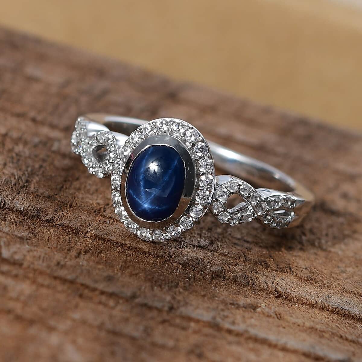 Blue Star Sapphire (DF), White Zircon Ring in Rhodium Over Sterling Silver (Size 10.0) 1.85 ctw image number 1