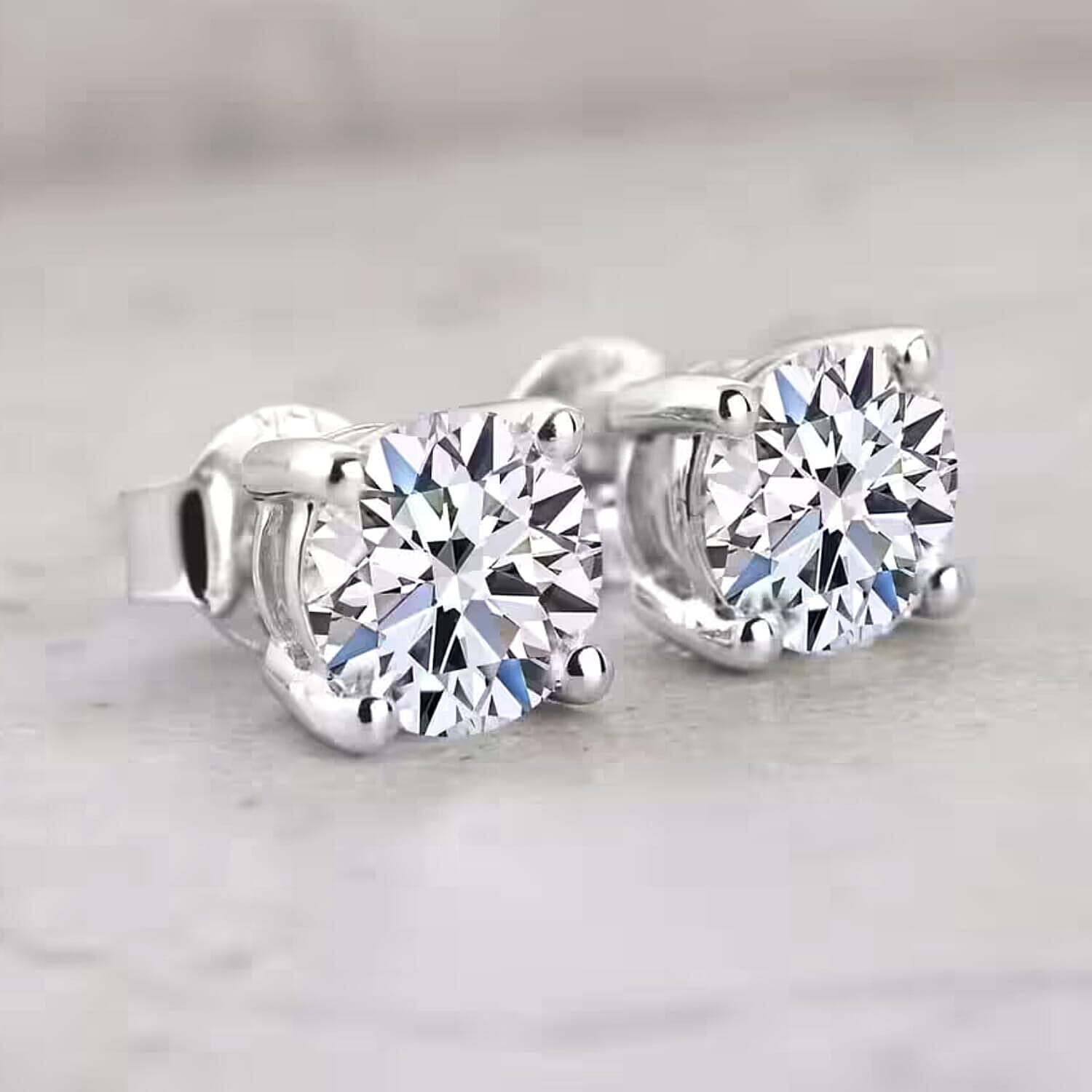 IGI Certified Luxuriant Lab Grown Diamond E-F VS 0.50 ctw Solitaire Stud Earrings in 10K White Gold