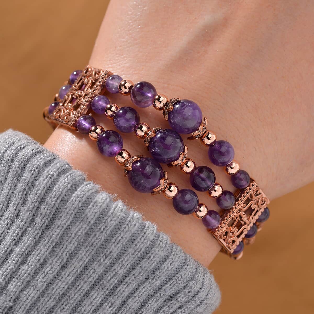 African Amethyst 65.00 ctw Bangle Bracelet in Rosetone (7-0-9.0In) image number 1