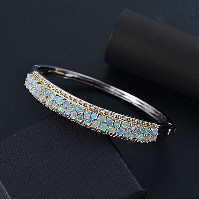 Ethiopian Welo Opal 4.20 ctw Aurora Cascade Bangle Bracelet in 18K Vermeil YG and Rhodium Over Sterling Silver (7.25 In)