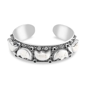 Bali Legacy Carved Bone and Blue Topaz 1.20 ctw Moon Cuff Bracelet in Sterling Silver (8.00In)