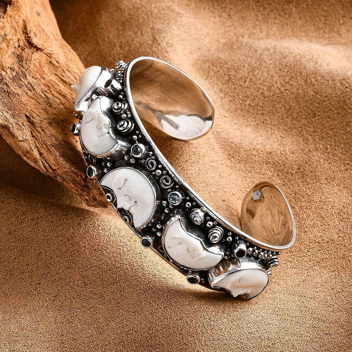 Bali Legacy Carved Bone and Blue Topaz 1.20 ctw Bangle Bracelet in Sterling Silver (8.00In) image number 1