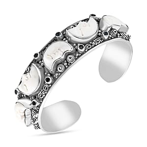 Bali Legacy Carved Bone and Blue Topaz 1.20 ctw Moon Cuff Bracelet in Sterling Silver (8.00In)