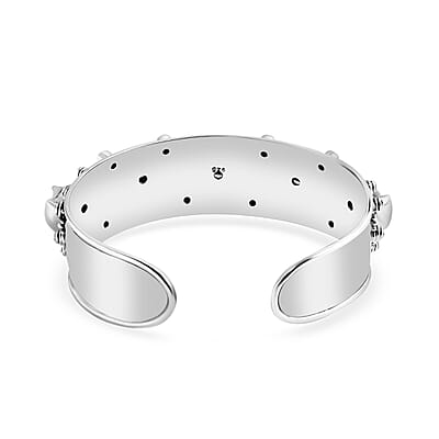 Bali Legacy Carved Bone and Blue Topaz 1.20 ctw Moon Cuff Bracelet in Sterling Silver (8.00In)