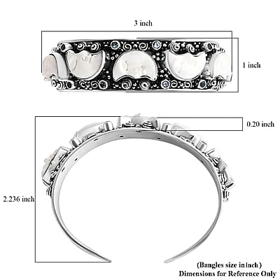 Bali Legacy Carved Bone and Blue Topaz 1.20 ctw Moon Cuff Bracelet in Sterling Silver (8.00In)