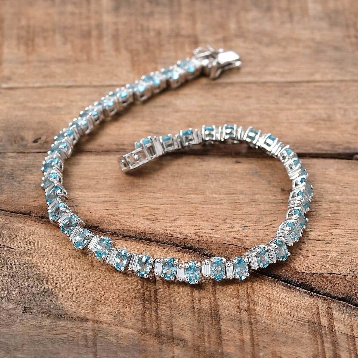 Premium Cambodian Blue Zircon and Moissanite 14.85 ctw Sea Wave Bracelet in Rhodium Over Sterling Silver (6.50 In) (Del. in 10-12 Days) image number 1