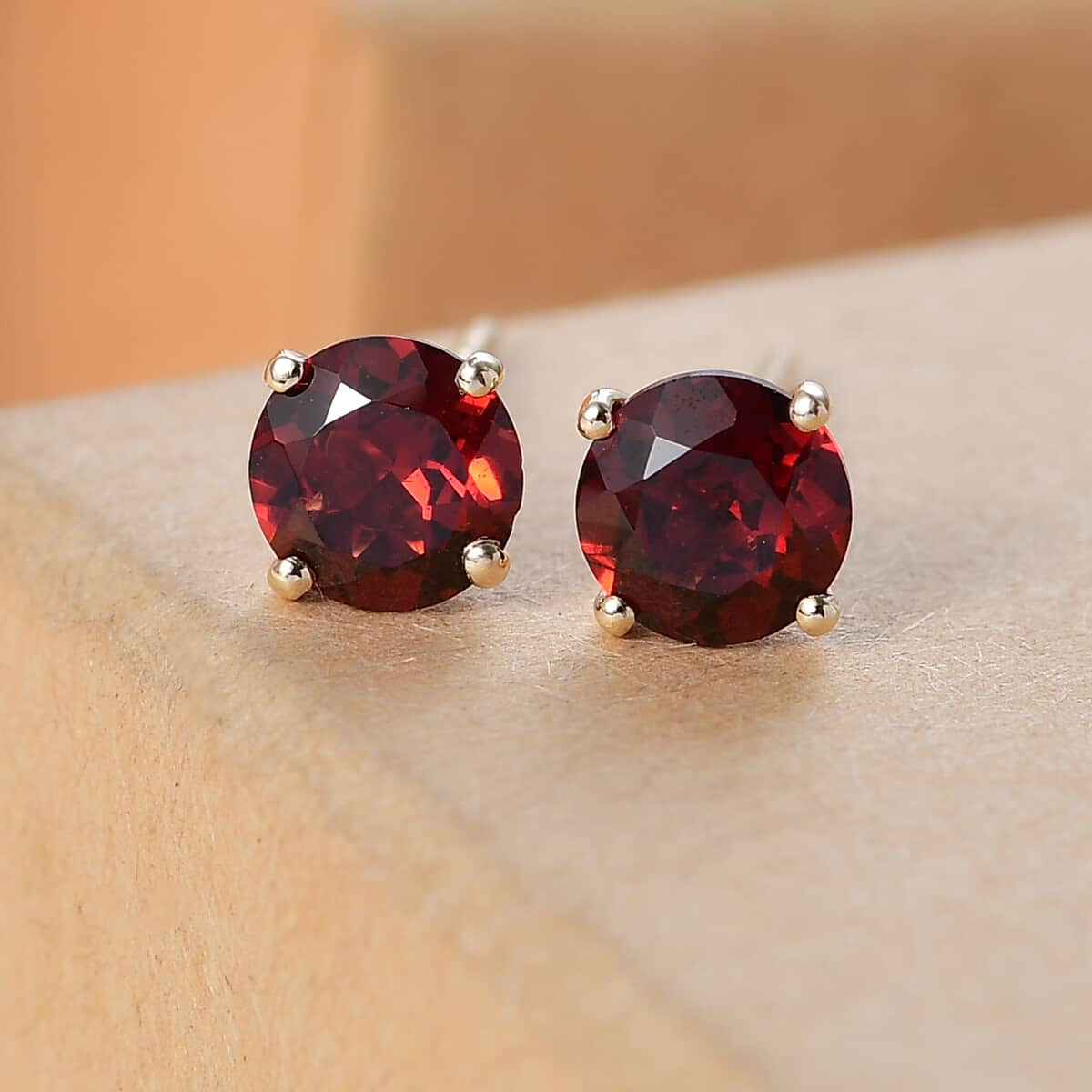 Luxoro AAA Mozambique Garnet 1.70 ctw Solitaire Stud Earrings in 10K Yellow Gold image number 1