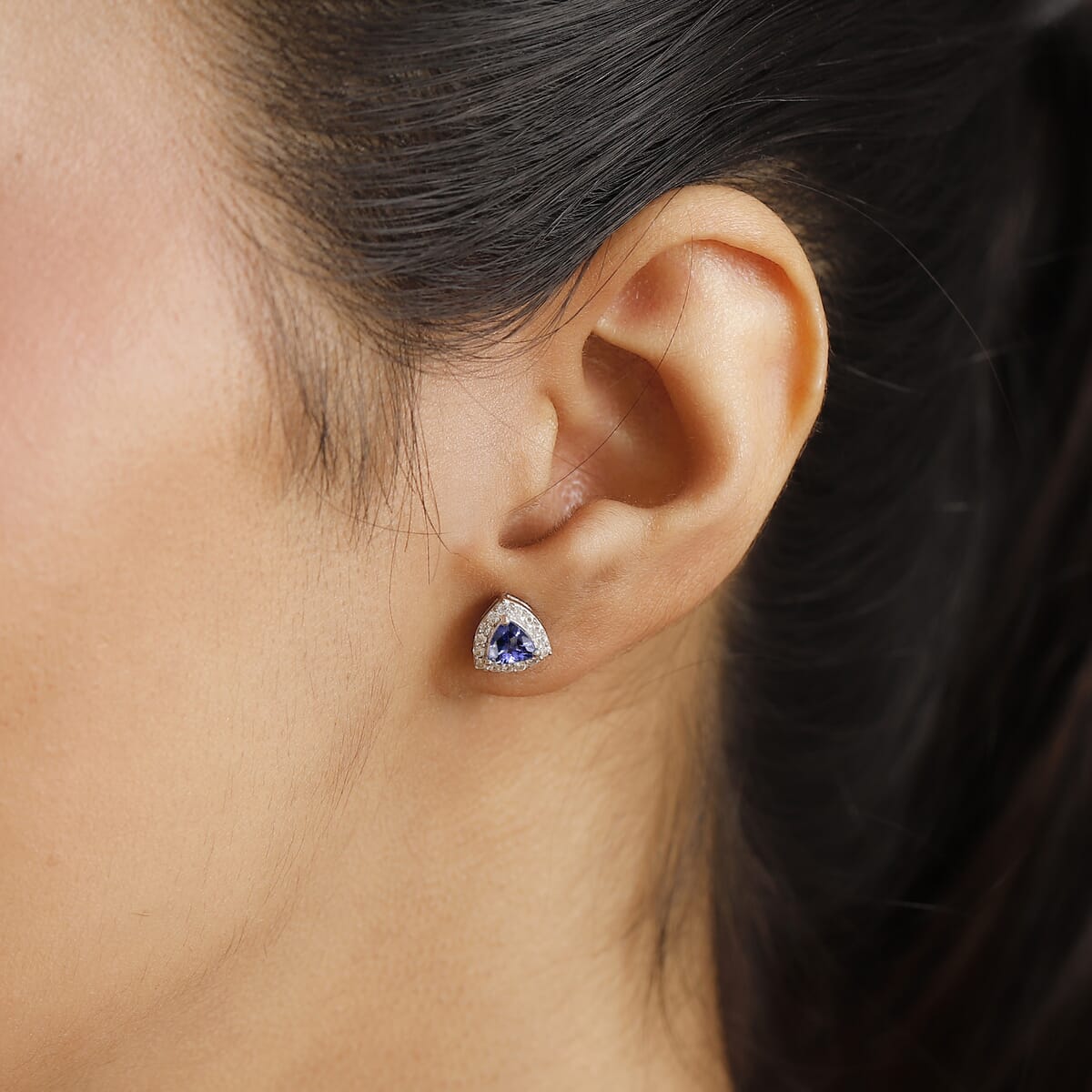 Tanzanite and White Zircon 1.10 ctw Solitaire Stud Earring in Rhodium Over Sterling Silver image number 2