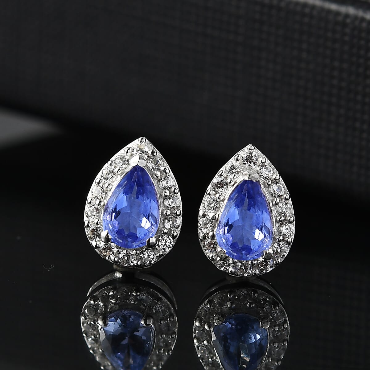 Tanzanite and White Zircon 1.00 ctw Solitaire Stud Earring in Rhodium Over Sterling Silver image number 1