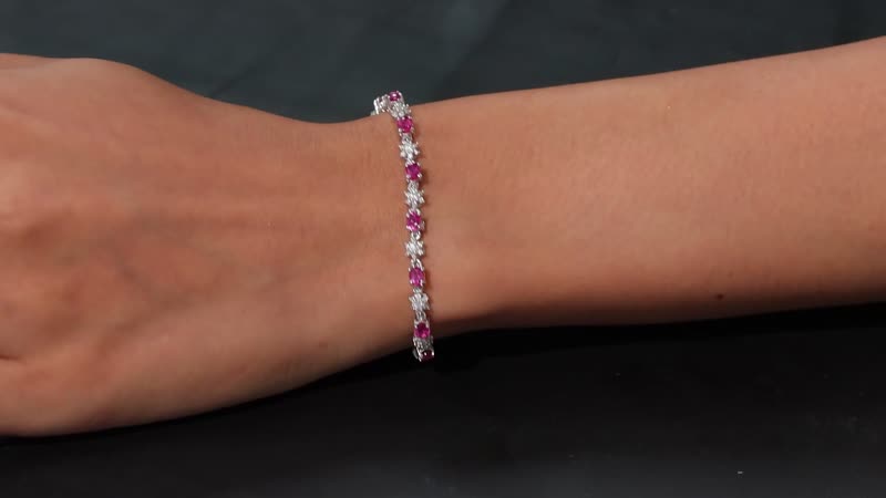 Premium Lab Created Bixbite and Moissanite 4.20 ctw Eternal Bloom Bracelet in Rhodium Over Sterling Silver (7.25 In)