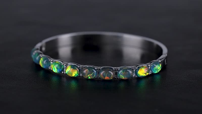 Green Magic Simulated Opal Resin Bangle Bracelet in Stainless Steel (7.50 In)