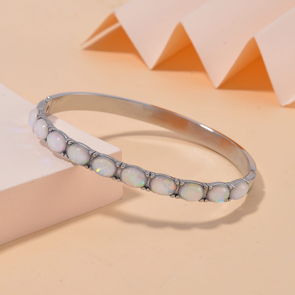White Aurora Borealis Magic Simulated Opal Resin Bangle Bracelet in Stainless Steel (7.50 In) image number 1