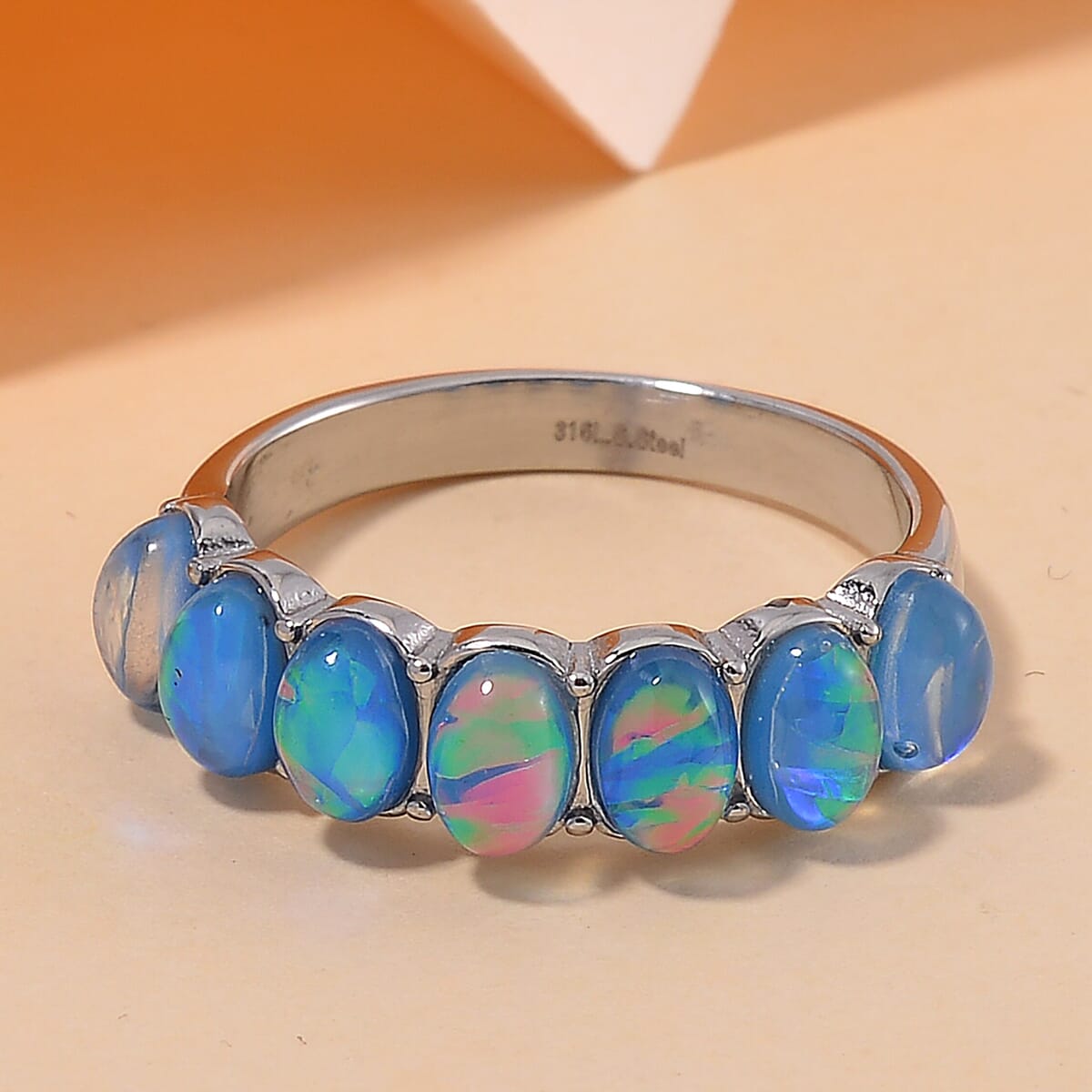 Blue Magic Simulated Opal Resin 7 Stone Ring in Stainless Steel (Size 7.0) image number 1