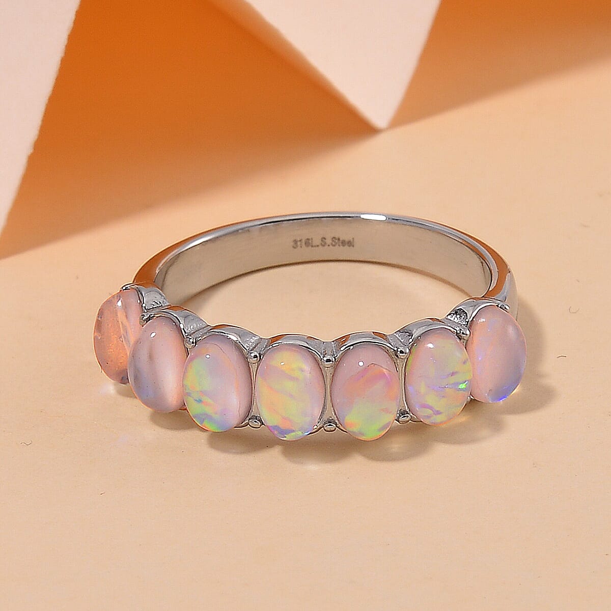 White Aurora Borealis Simulated Opal Resin 7 Stone Ring in Stainless Steel (Size 7.0) image number 1