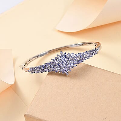 D'Joy Tanzanite 7.20 ctw Rising Flower Bangle Bracelet in Rhodium Over Sterling Silver (7.25 in)