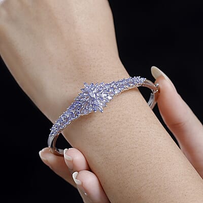 D'Joy Tanzanite 7.20 ctw Rising Flower Bangle Bracelet in Rhodium Over Sterling Silver (7.25 in)