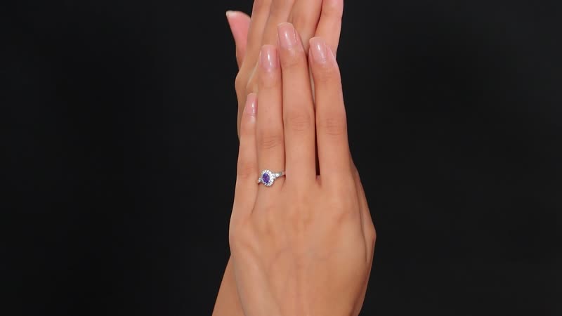 AAA Tanzanite, White Zircon Classic Halo Ring in Rhodium Over Sterling Silver (Size 10.0) 0.80 ctw