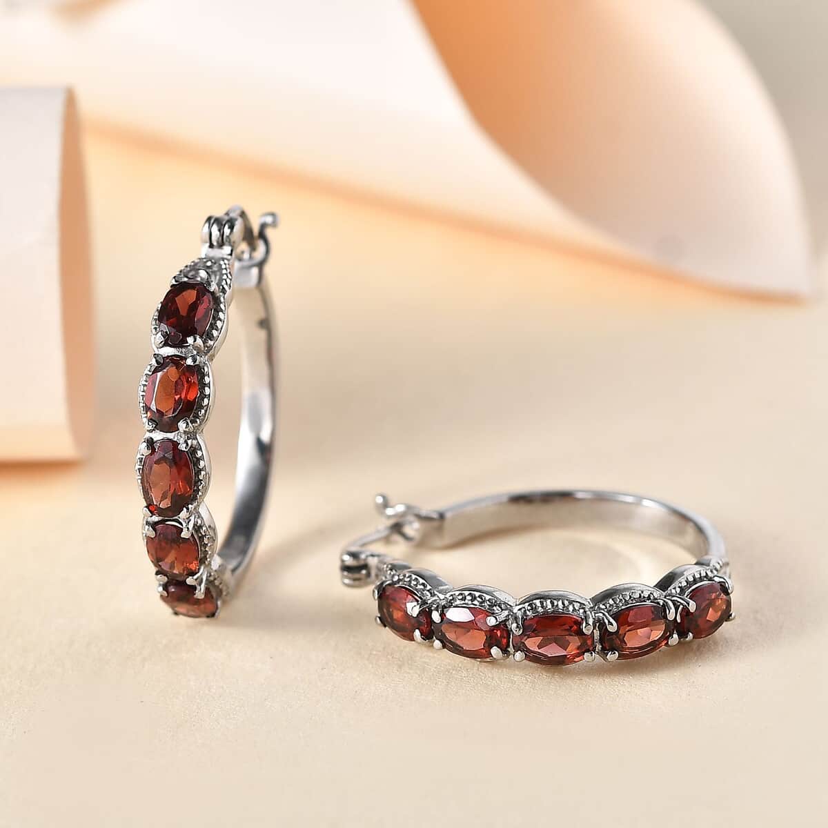 Mozambique Garnet 6.35 ctw Hoop Earrings in Stainless Steel image number 1