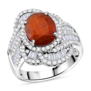 Tangerine Kyanite and Moissanite 5.35 ctw Swirl Halo Ring in Rhodium Over Sterling Silver (Size 8.0)