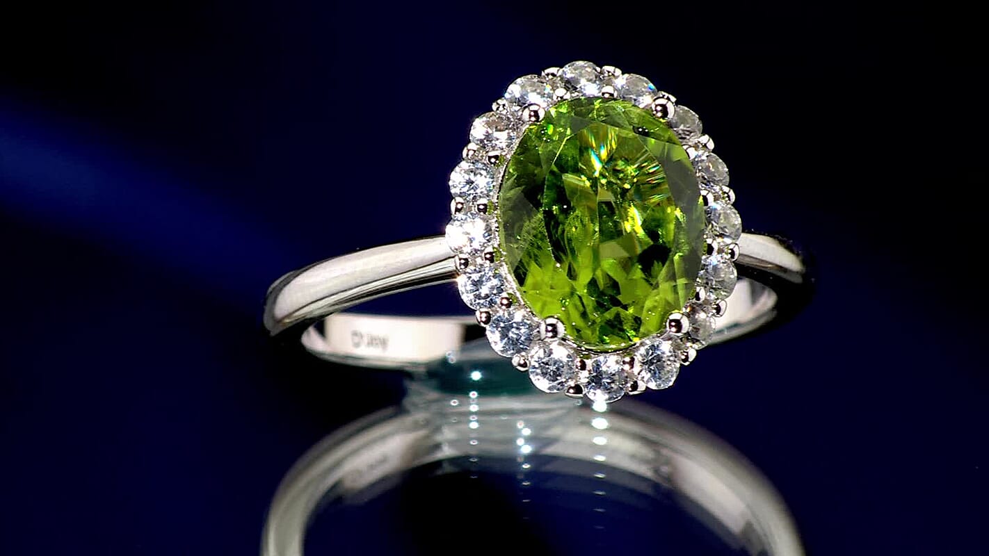 Hebei Peridot and White Zircon 3.40 ctw Halo Ring in Rhodium Over Sterling Silver (Size 10.0)