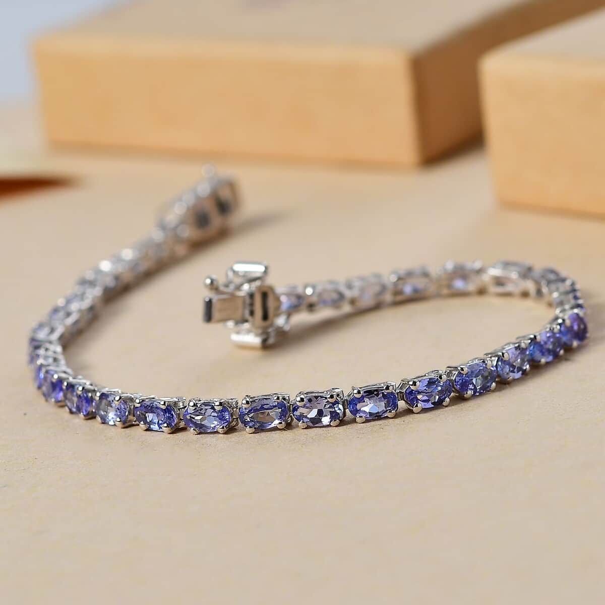 Doorbuster Tanzanite 6.15 ctw Tennis Bracelet in Rhodium Over Sterling Silver (7.25 In) image number 1