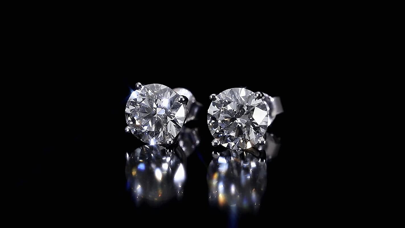 Luxuriant Lab Grown Diamond G-H SI 1.50 ctw Solitaire Stud Earrings in Platinum Over Sterling Silver