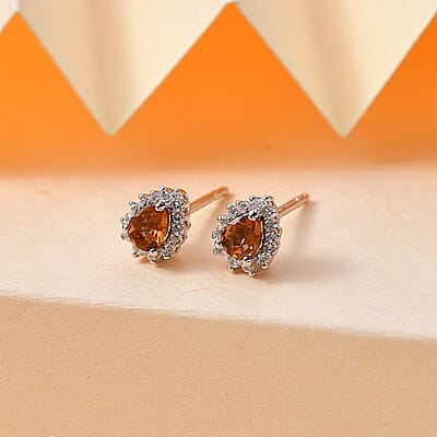 D'Joy Ceylon Hessonite Garnet and White Zircon 0.60 ctw Sunburst Stud Earrings in Rhodium Over Sterling Silver