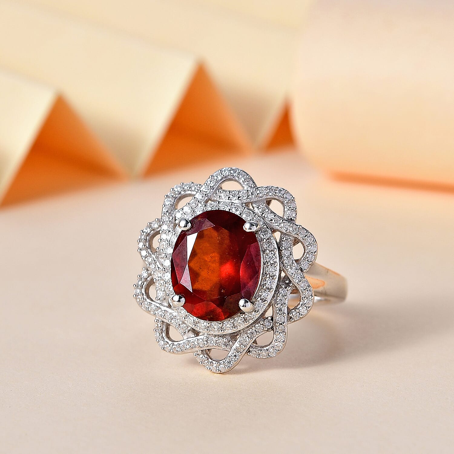 Premium Tanzanian Sunlit Garnet, Moissanite Ring in Rhodium Over Sterling Silver (Size 7.0) 4.90 ctw