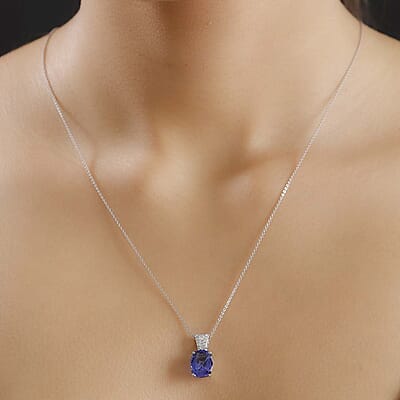 The Jennilee Certified & Appraised Rhapsody AAAA Tanzanite and E-F VS2 Diamond 3.95 ctw Statement Pendant in 950 Platinum