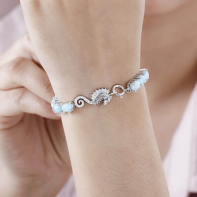 Larimar and Moissanite 17.50 ctw Seahorse Tennis Bracelet in Rhodium Over Sterling Silver (6.50 In)