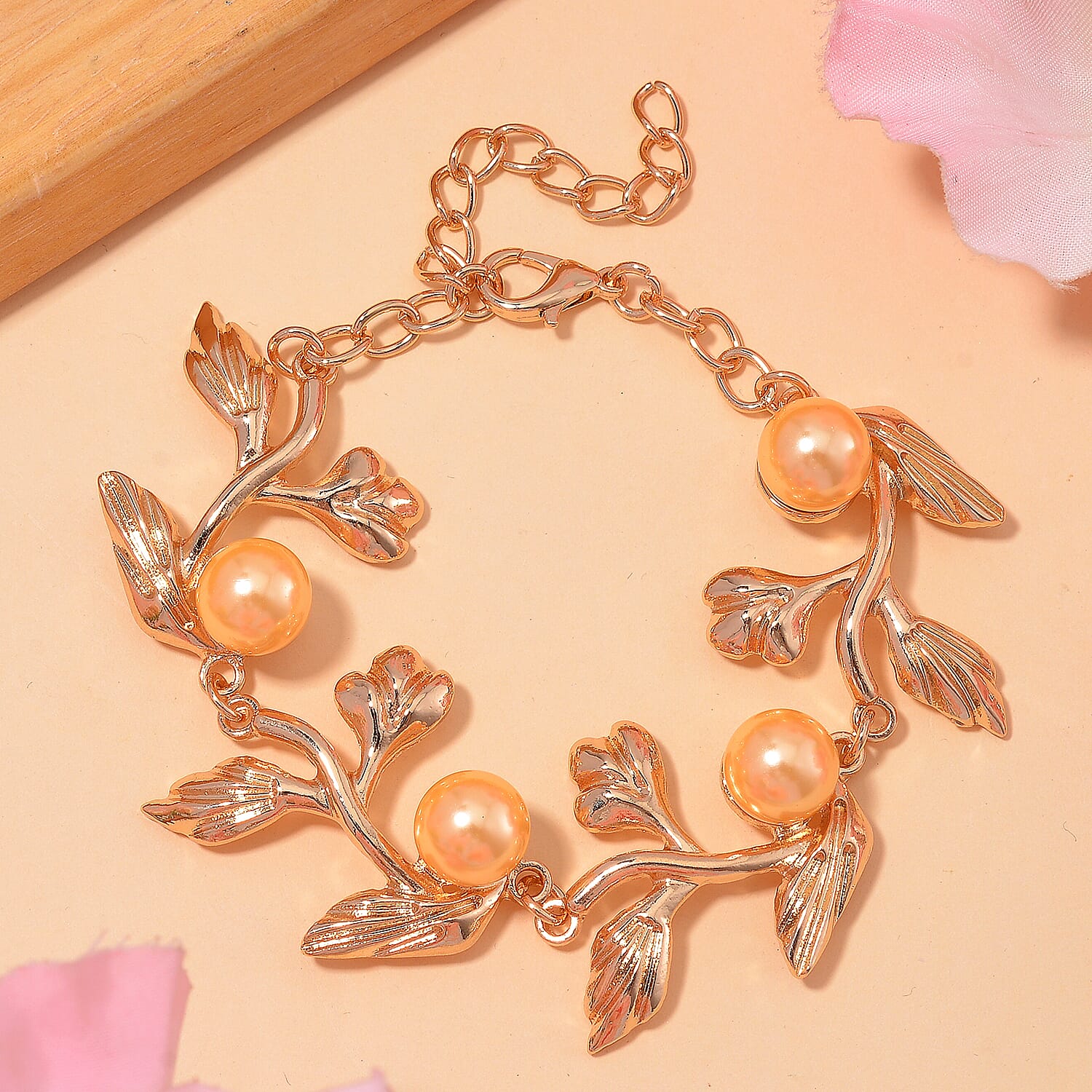 Golden Color Shell Pearl Designer Inspired Leaf Bracelet (7-9In) in Goldtone