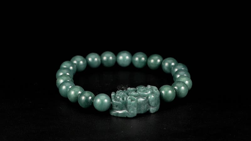 Natural Olmec Jadeite 200.00 ctw Carved Pixiu and Beaded Stretch Bracelet