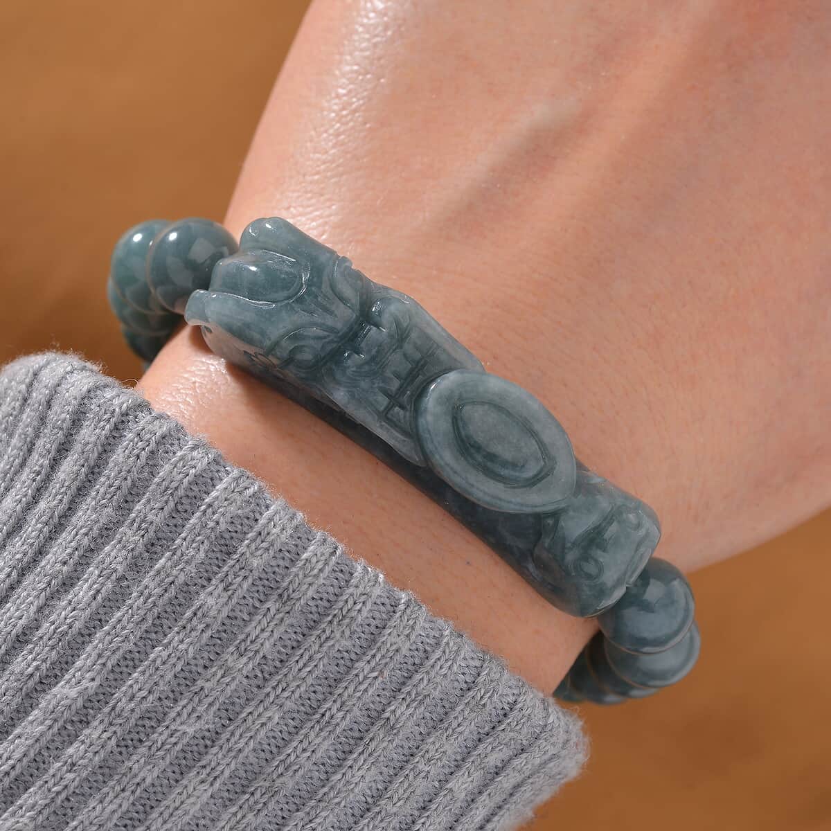 Natural Olmec Jadeite 200.00 ctw Carved Dragon and Beaded Stretch Bracelet image number 1