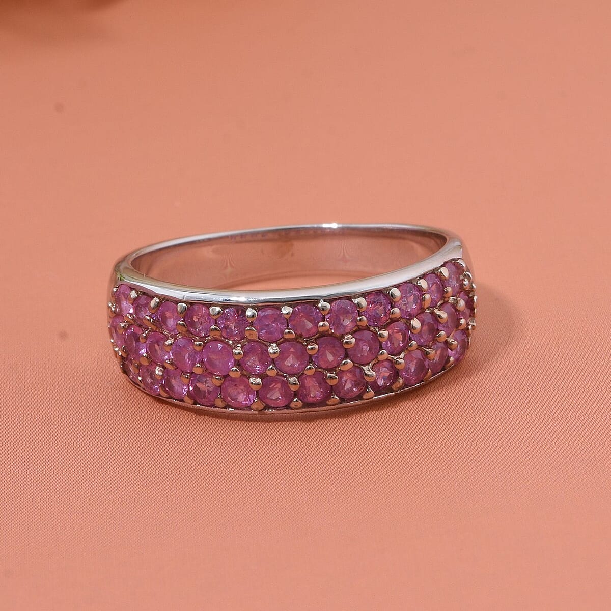 Madagascar Pink Sapphire 1.50 ctw Eclipse Band Ring in Rhodium Over Sterling Silver (Size 5.0) image number 1