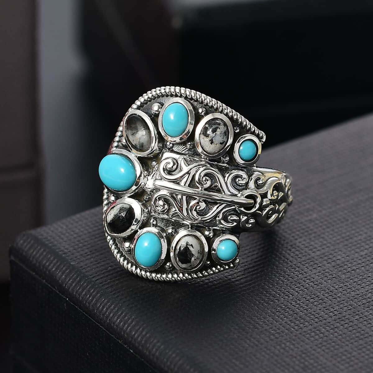 Artisan Crafted Sleeping Beauty Turquoise and White Buffalo 2.10 ctw Buckle Ring in Black Oxidized Sterling Silver (Size 7.0) image number 1