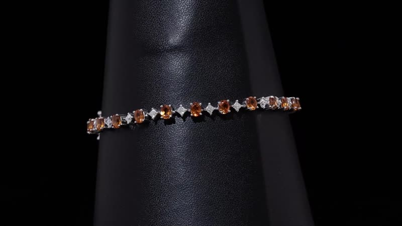 D'Joy Ceylon Hessonite Garnet and Moissanite 5.90 ctw Bracelet in Rhodium Over Sterling Silver (7.25 In)