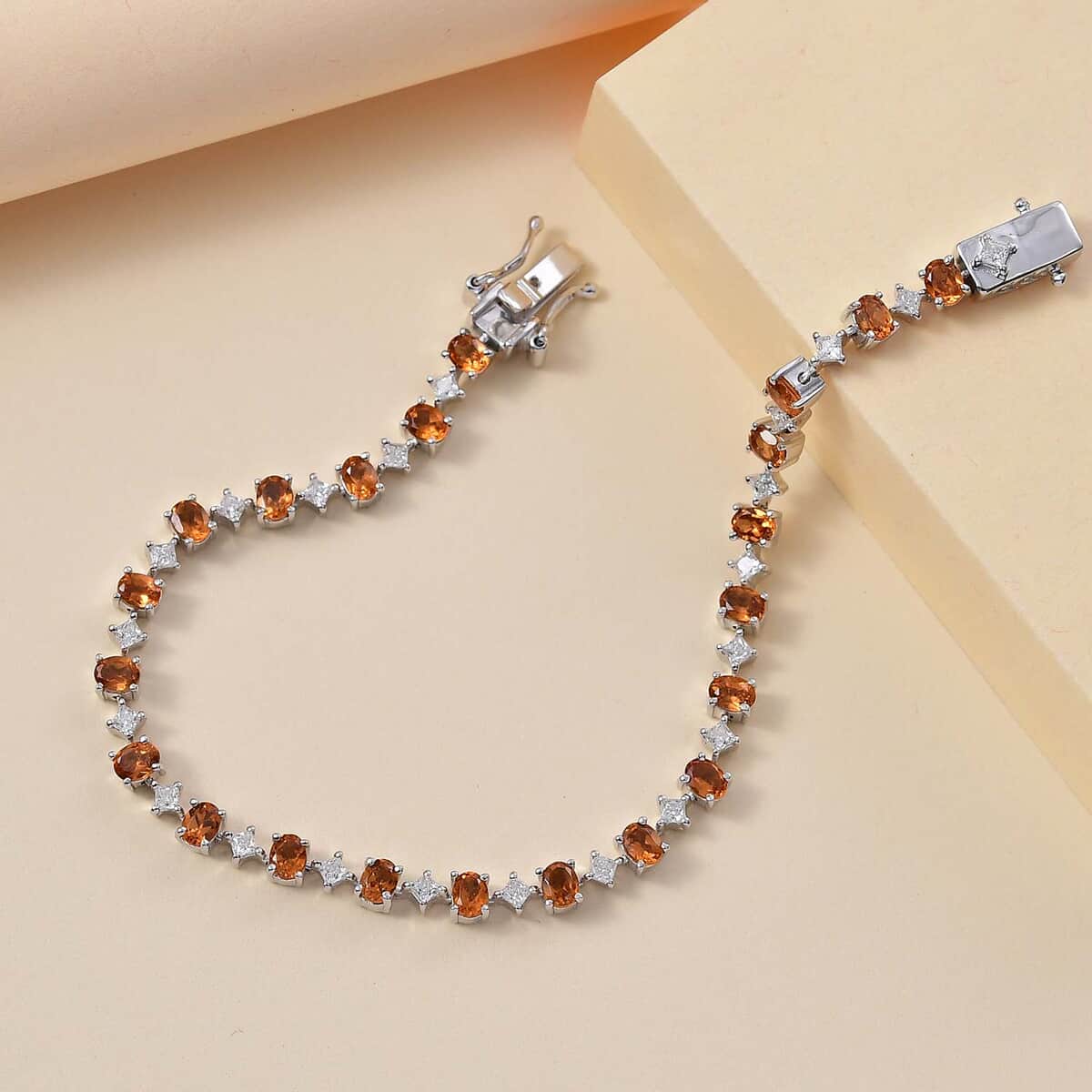 Ceylon Hessonite Garnet and Moissanite 5.90 ctw Bracelet in Rhodium Over Sterling Silver (7.25 In) image number 1