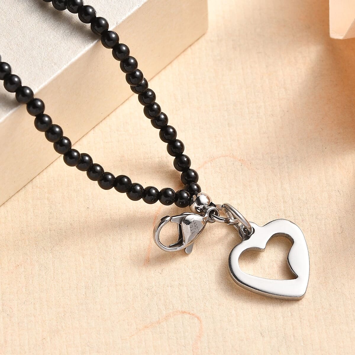 Thai Black Spinel 33.00 ctw Beaded Double Row Bracelet with Heart Charm in Stainless Steel (7.25-9.25In) image number 1