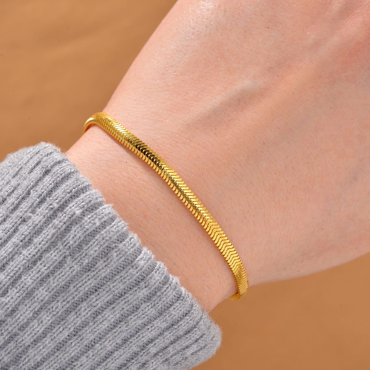 Herringbone Chain Bracelet in 14K Yellow Gold Over Sterling Silver (6.50-8.0In) 3.50 Grams image number 1