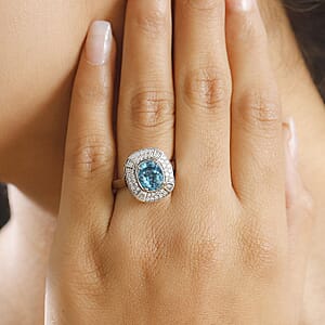Rhapsody 950 Platinum AAAA Ratanakiri Blue Zircon, Diamond (E-F, VS) (0.57 cts) Ring (Size 8.5) (7.85 g) 6.00 ctw