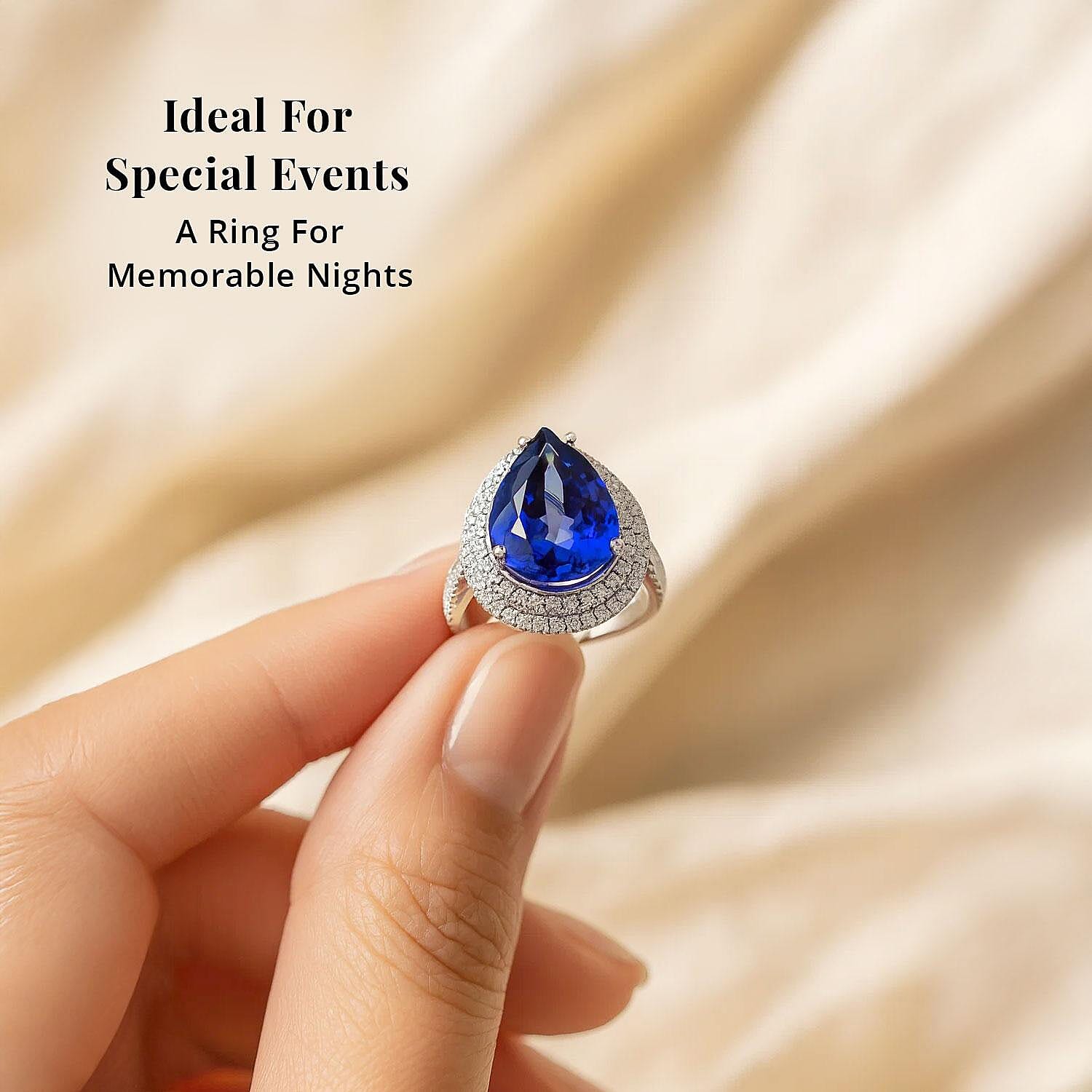 Certified and Appraised Rhapsody AAAA Tanzanite, E-F, VS Diamond Ring in 950 Platinum 9.40 ctw (Size 10.0)