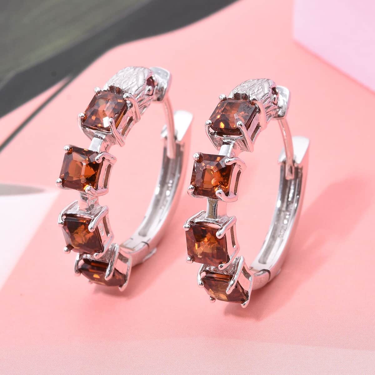 Doorbuster AAA Sunset Zircon and Niassa Ruby (FF) 7.00 ctw Eagle Hoop Earrings in Rhodium Over Sterling Silver image number 1