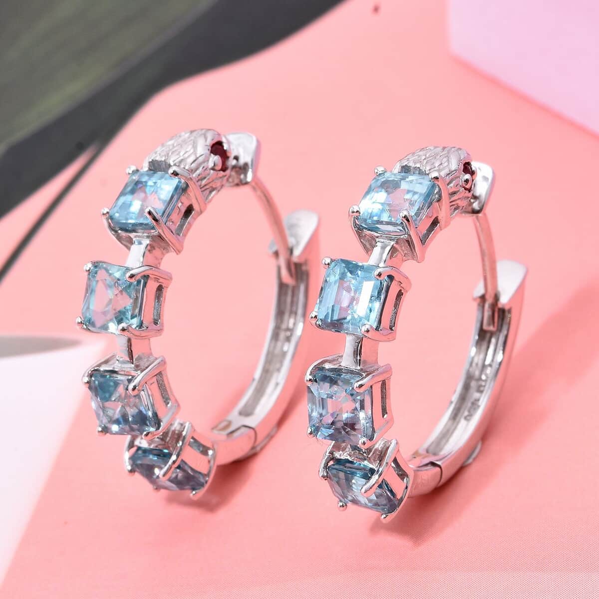 AAA Cambodian Blue Zircon and Niassa Ruby (FF) 6.35 ctw Eagle Hoop Earrings in Rhodium Over Sterling Silver image number 1