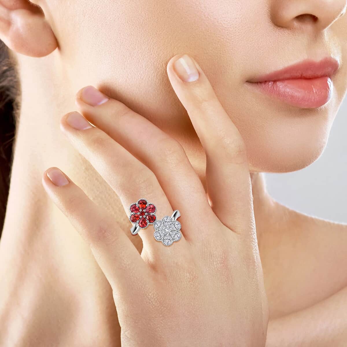 Premium Red Sapphire and Moissanite 2.30 ctw Bypass Flower Ring in Rhodium Over Sterling Silver (Size 5.0) image number 2