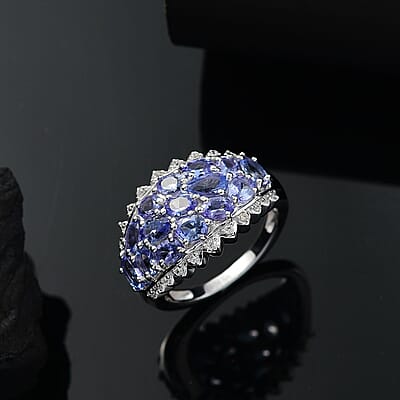 D'Joy Tanzanite and White Zircon 3.25 ctw Tiara Ring in Rhodium Over Sterling Silver (Size 10.0)