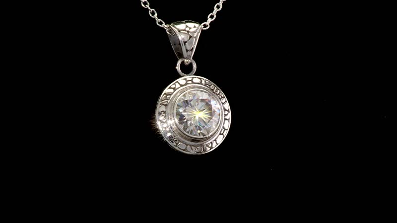 Bali Legacy Moissanite 4.50 ctw Pebble Texture Pendent in Sterling Silver