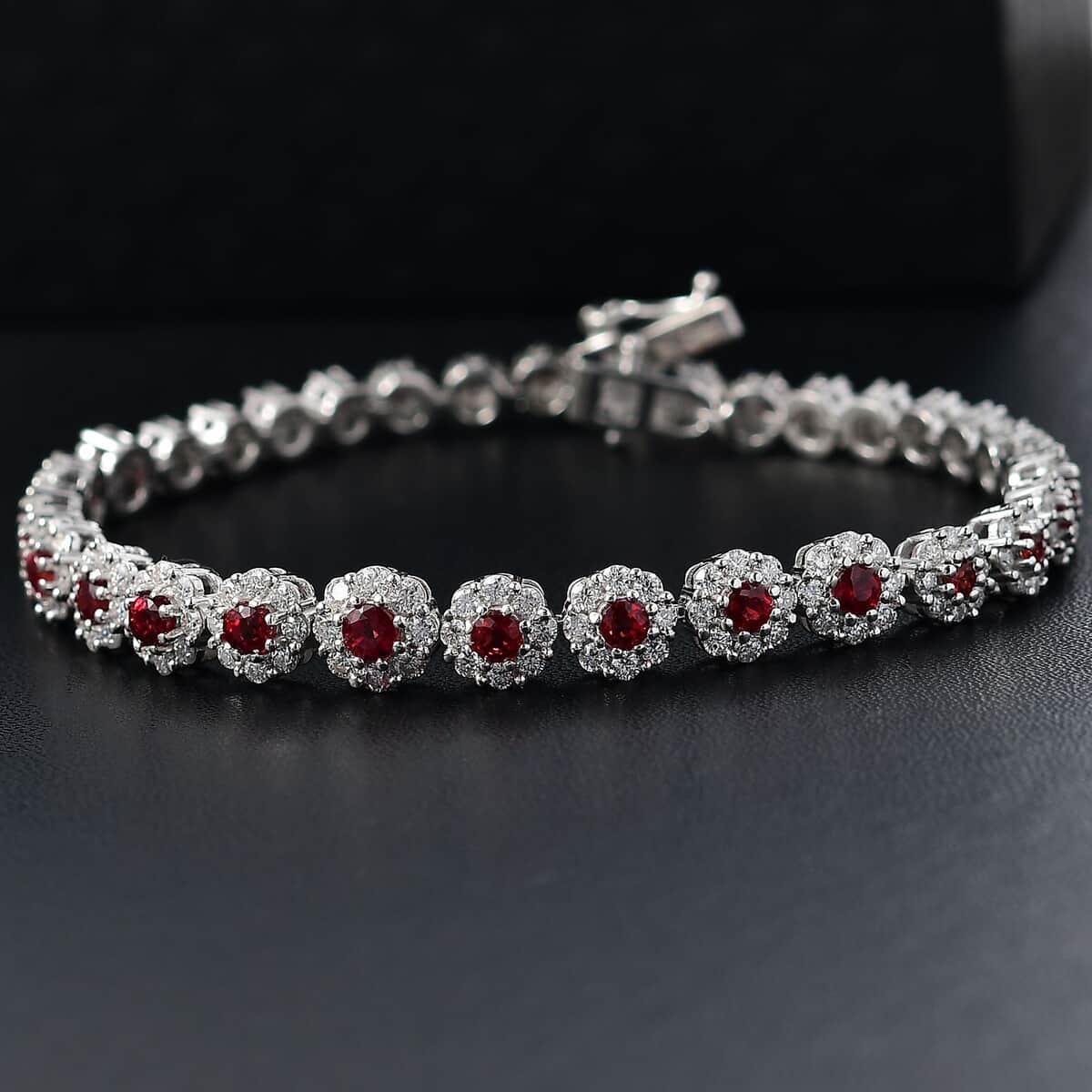 Premium Red Sapphire and Moissanite 5.70 ctw Floral Halo Bracelet in Rhodium Over Sterling Silver (6.50 In) (Del. in 10-12 Days) image number 1