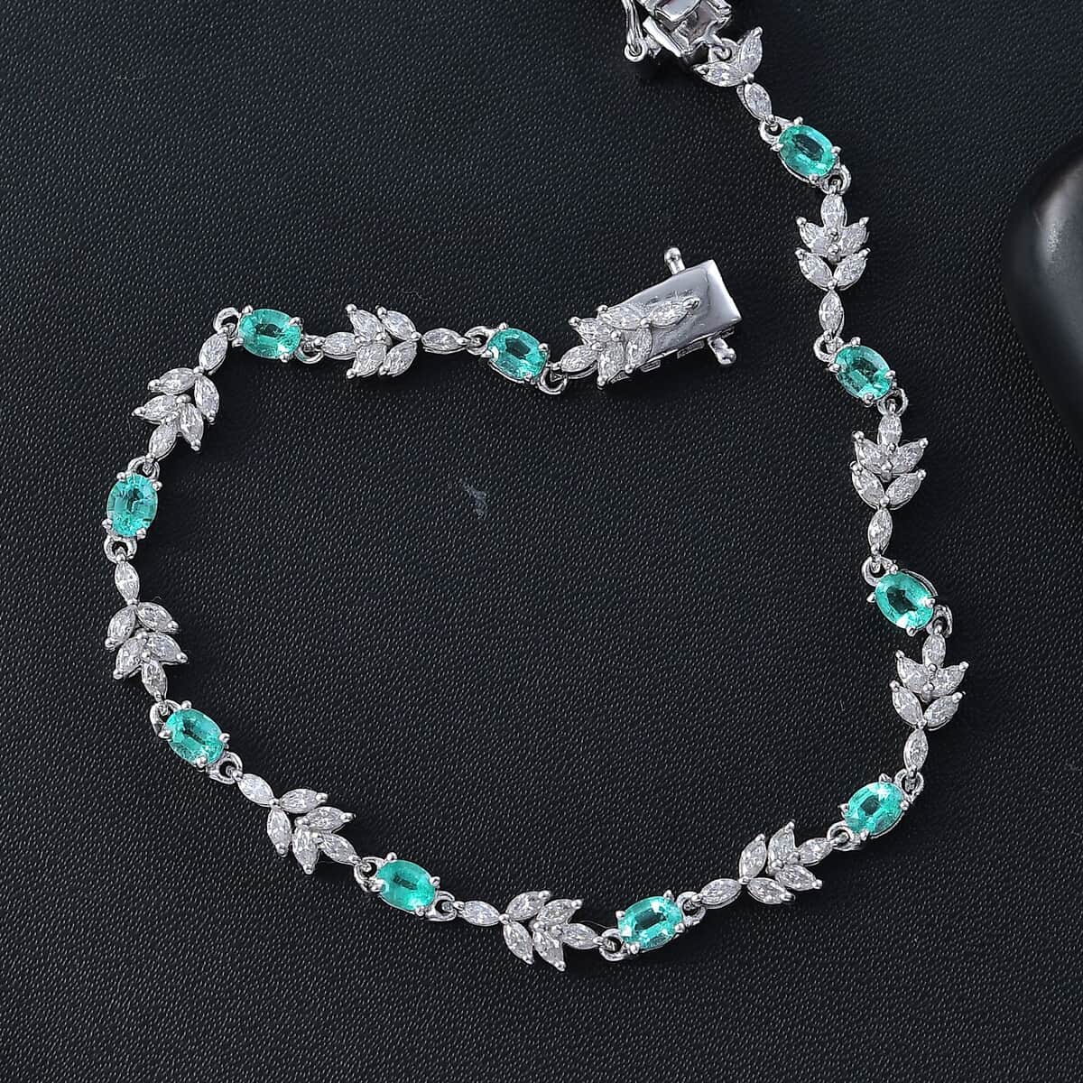 Boyaca Colombian Emerald and Moissanite 3.50 ctw Leaves Bracelet in Rhodium Over Sterling Silver (7.25 In) image number 1